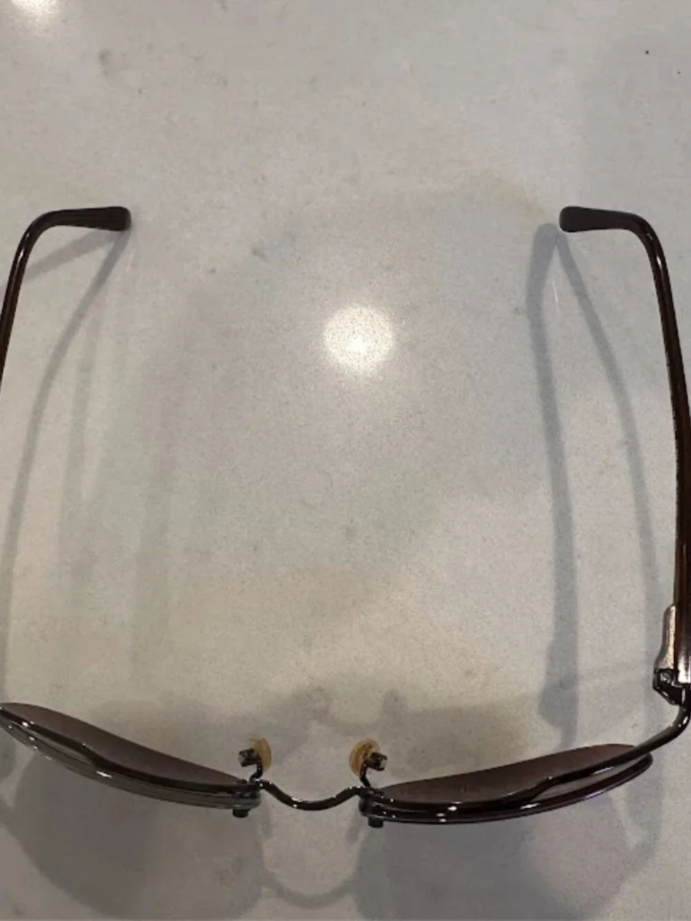 Maui Jim Brown Lens Oval Sunglasses with Gold Nose Pads and Dark Brown Frame